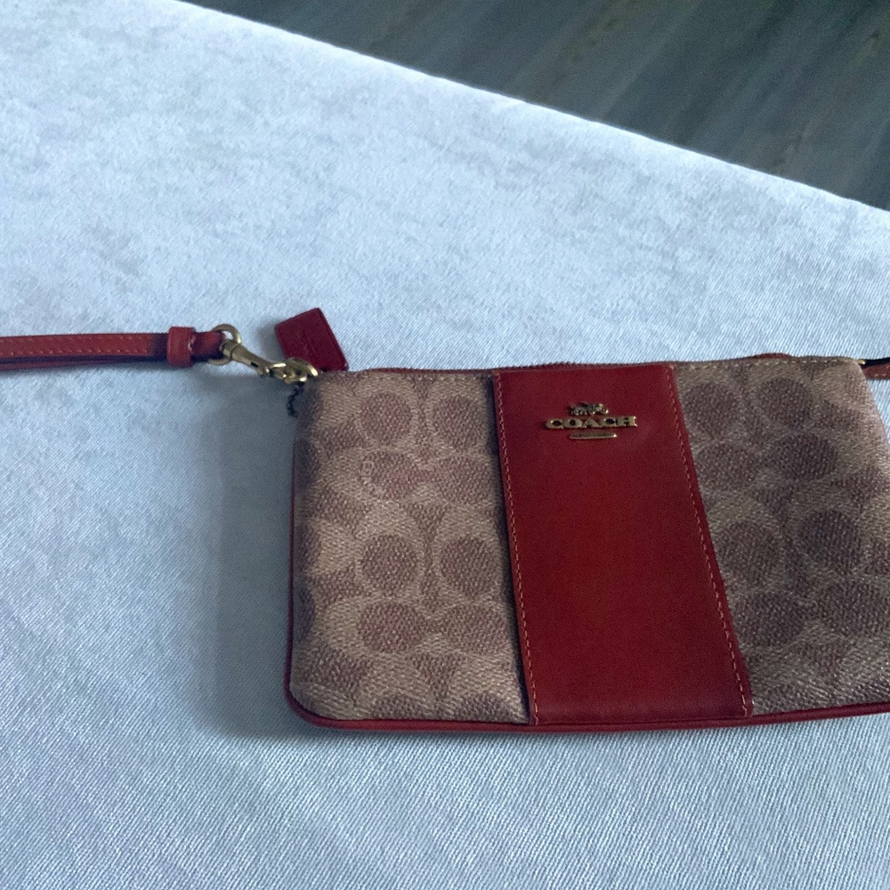 Like new Coach wristlet Brown logo